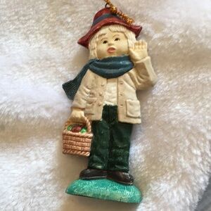 Charming Figurine with Red Hat and Blue Scarf